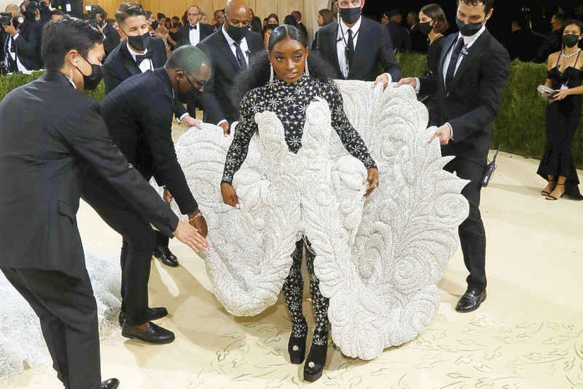 Gold armor for Lil Nas X, all black for Kim Kardashian at Met Gala